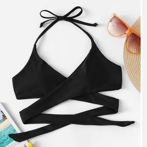Black never worn criss cross bathing suit top